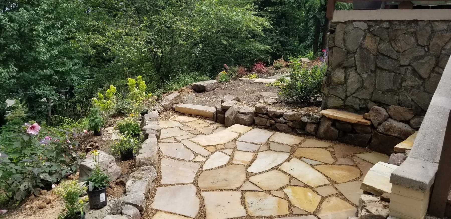 Finished flagstone walk with pea gravel joints and garden planting, view 6