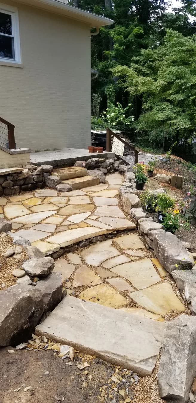 Flagstone landing and walk with pea gravel joints near stone steps, view 7