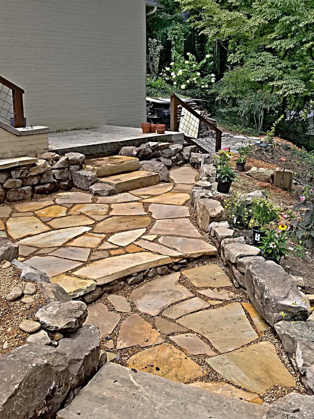 Close view of flagstone walk with pea gravel joints, view 9