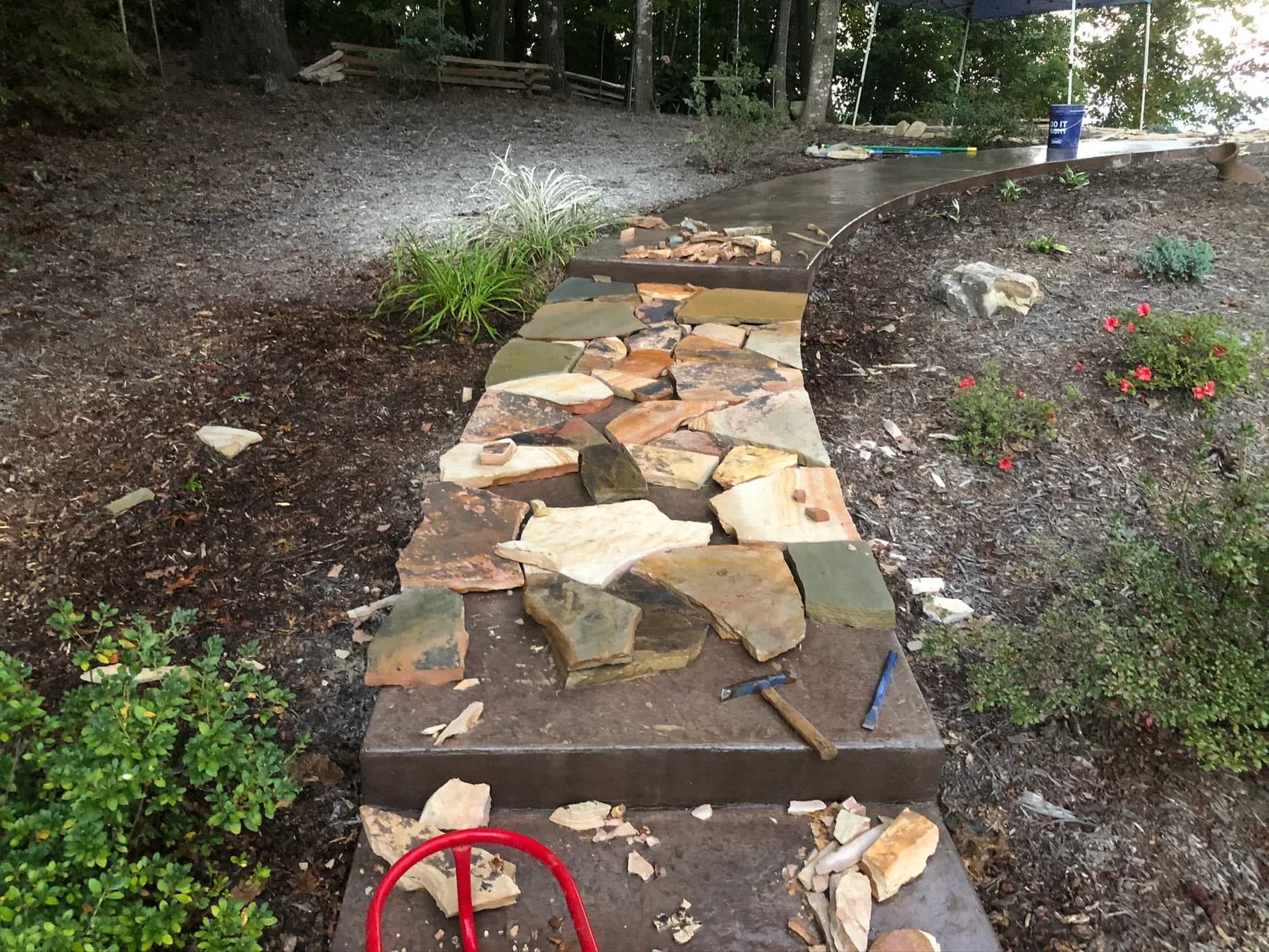 Mortared flagstone step and walkway transition in progress, view 10